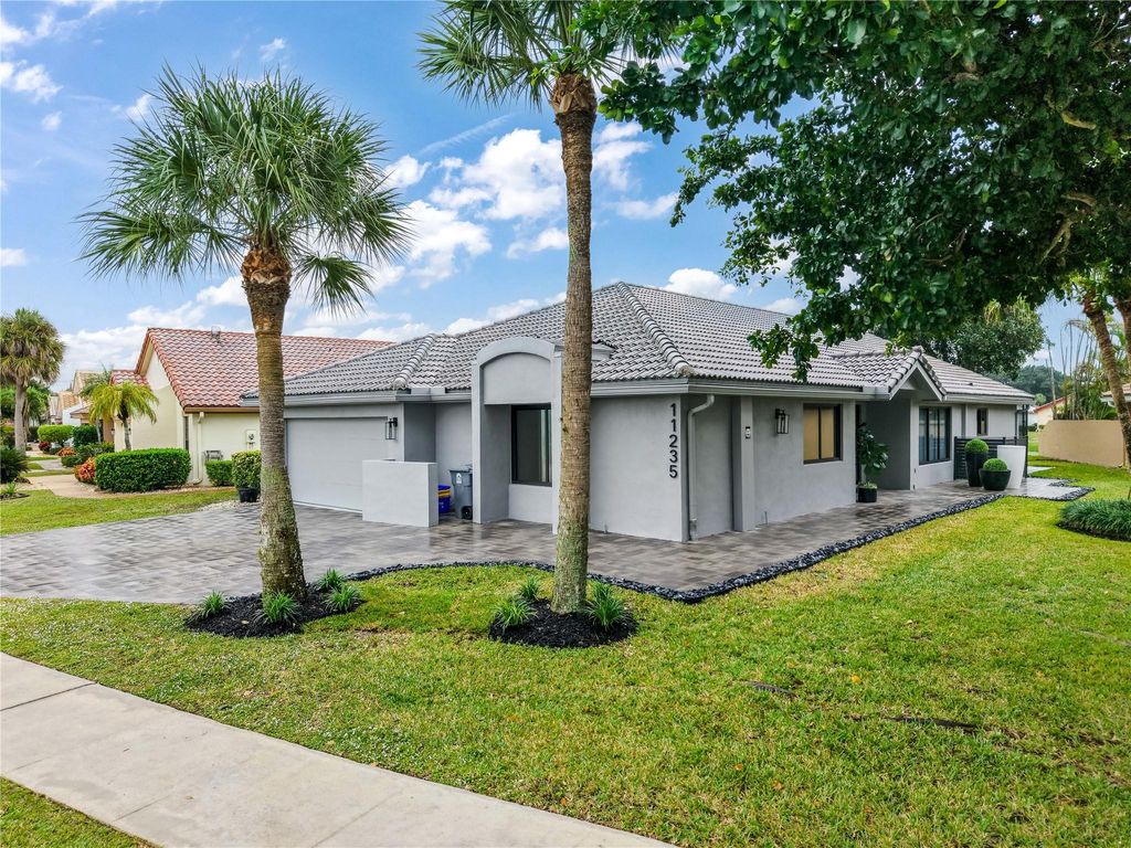 Photo of 11235 Clover Leaf Cir, Boca Raton, FL 33428 (MLS # F10539169)