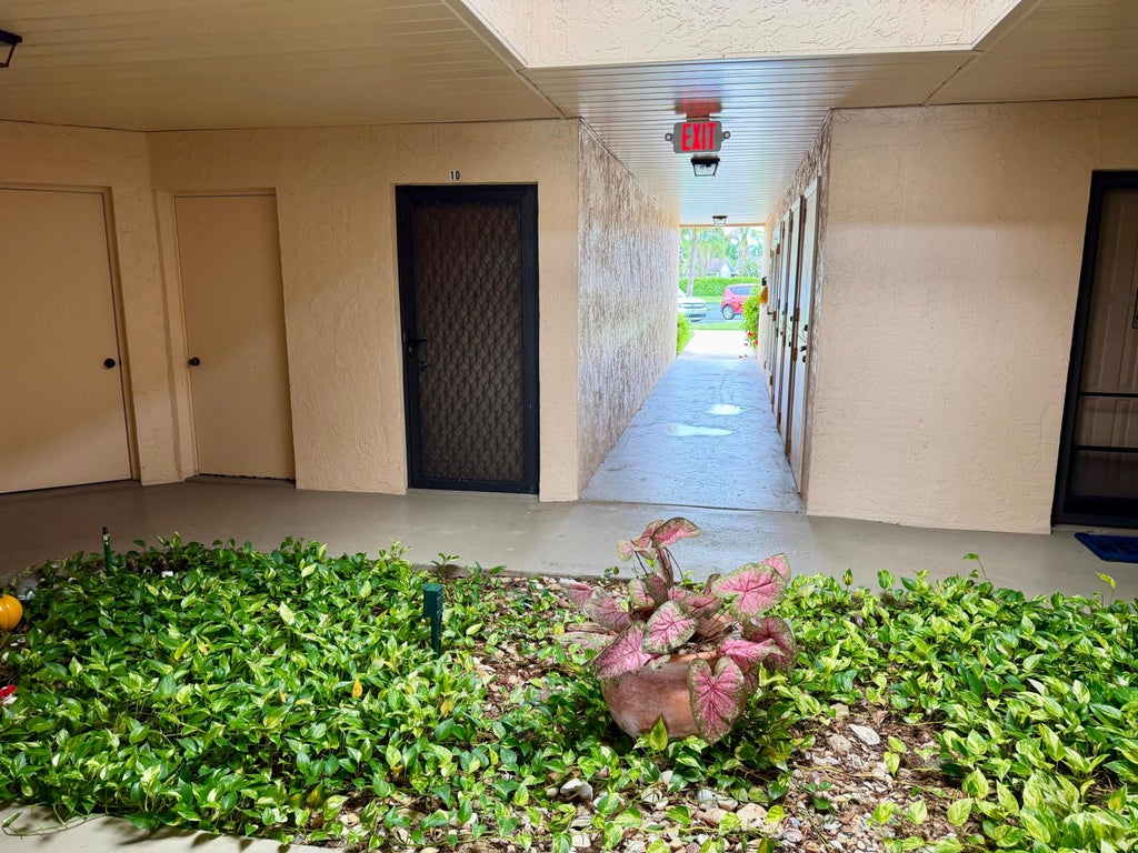 Photo of 1901 NE COLLINS Circle #9-10, Jensen Beach, FL 34957 (MLS # B26060004)
