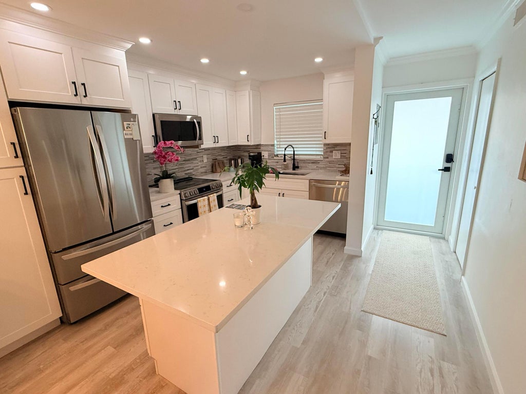 Photo of 401 NE 19TH Avenue #53, Deerfield Beach, FL 33441 (MLS # B26091015)