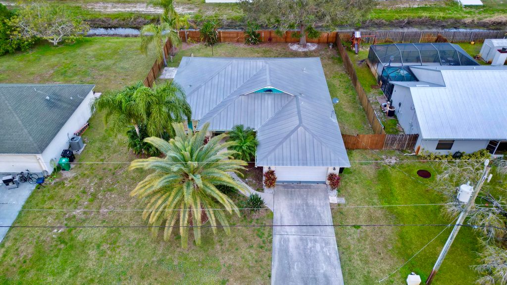 Photo of 743 SW Mccoy Avenue, Port Saint Lucie, FL 34953 (MLS # R11166661)
