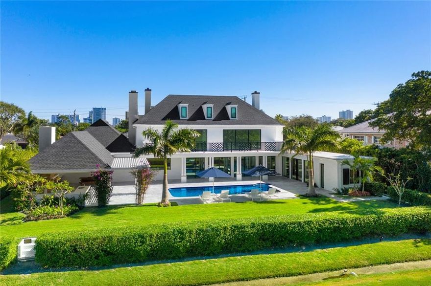 Welcome to the magnificently renovated Coral Ridge Estates "Eastover" home, located alongside the 8th hole of the prestigious Coral Ridge Country Club golf course.  This property is an amazing, modern farmhouse, masterpiece that features 11,575 square feet of interior living space, 1,520 square feet of covered exterior living space, a full home generator, fully finished summer kitchen with a gas range, 7 bedrooms, 7.5 bathrooms, an oversized 6+ car garage with 9 foot doors tall enough to install lifts, dolomite bathrooms, wood & marble floors, custom cabinetry throughout and so much more.  Truly a one of a kind property. .