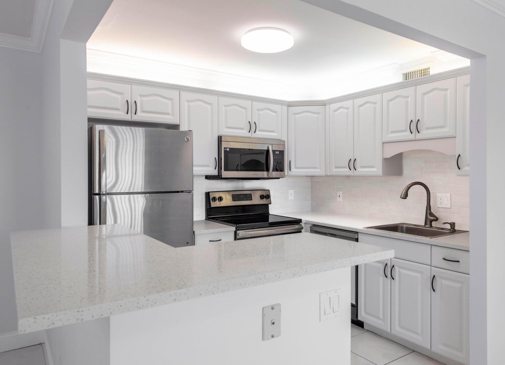 Photo of 190 Saxony D, Delray Beach, FL 33446 (MLS # B26077418)