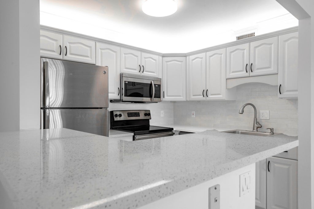 Photo of 190 Saxony D, Delray Beach, FL 33446 (MLS # B26077418)