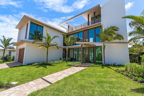 Photo of 390 Jupiter Lane, Juno Beach, FL 33408 (MLS # B26036863)