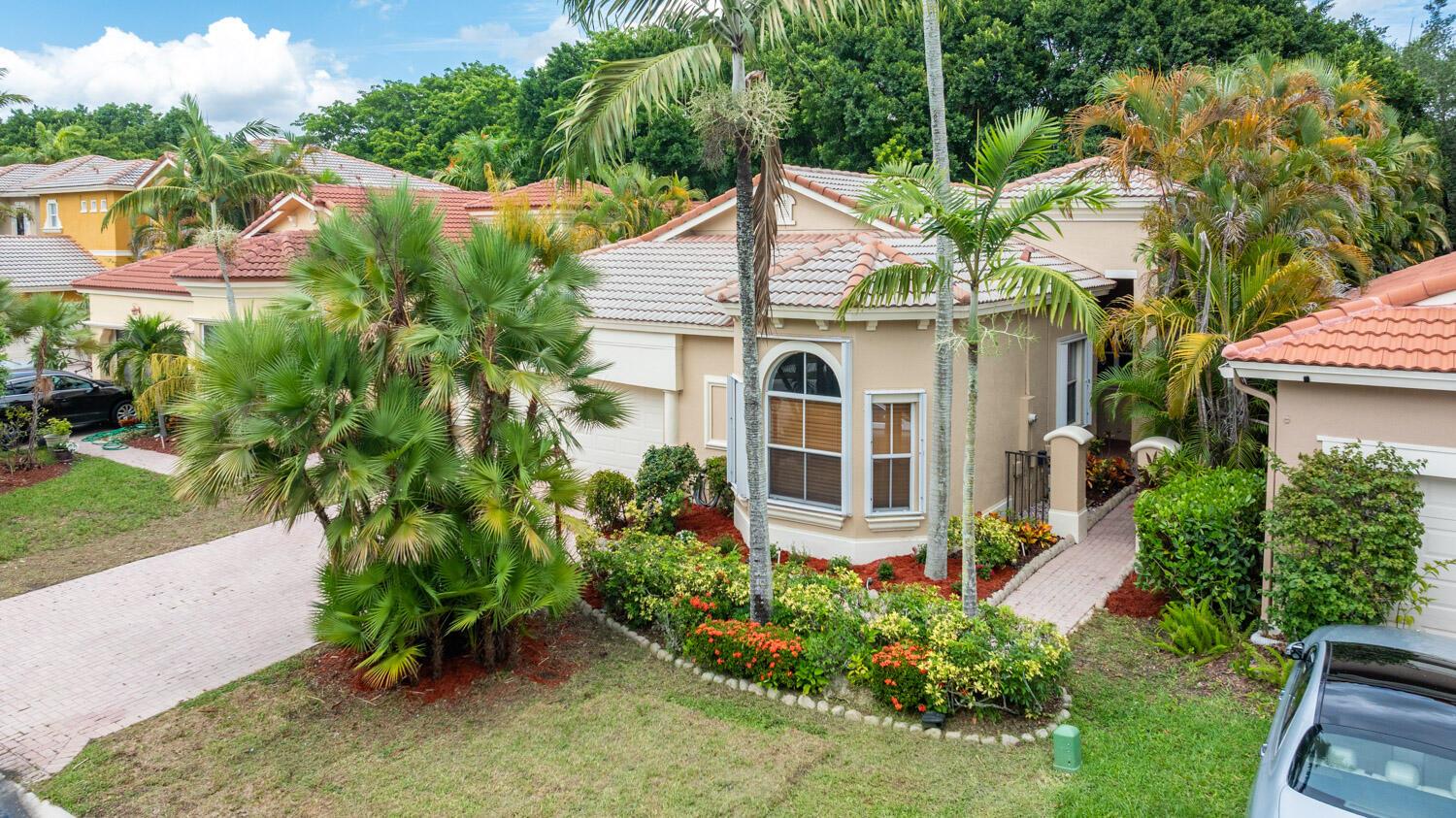 Enjoy the country club lifestyle of the renowned community of Heron Bay! Heron Bay is a master planned community with beautiful tree lined streets, extensive clubhouse and amenities package that has few rivals in the South Florida MSA. The home being offered has all of the upgrades including high end kitchen, tile and wood flooring, modern window treatments, a split floor plan and a private swimming pool.