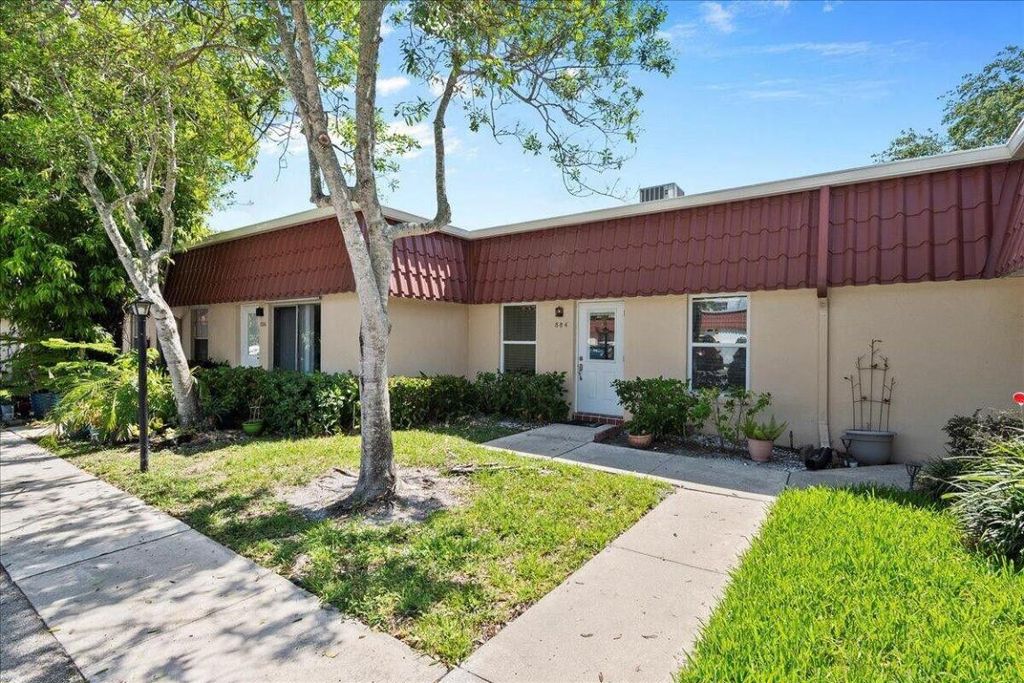 Photo of 884 Worcester Lane, Lake Worth, FL 33467 (MLS # R11153372)