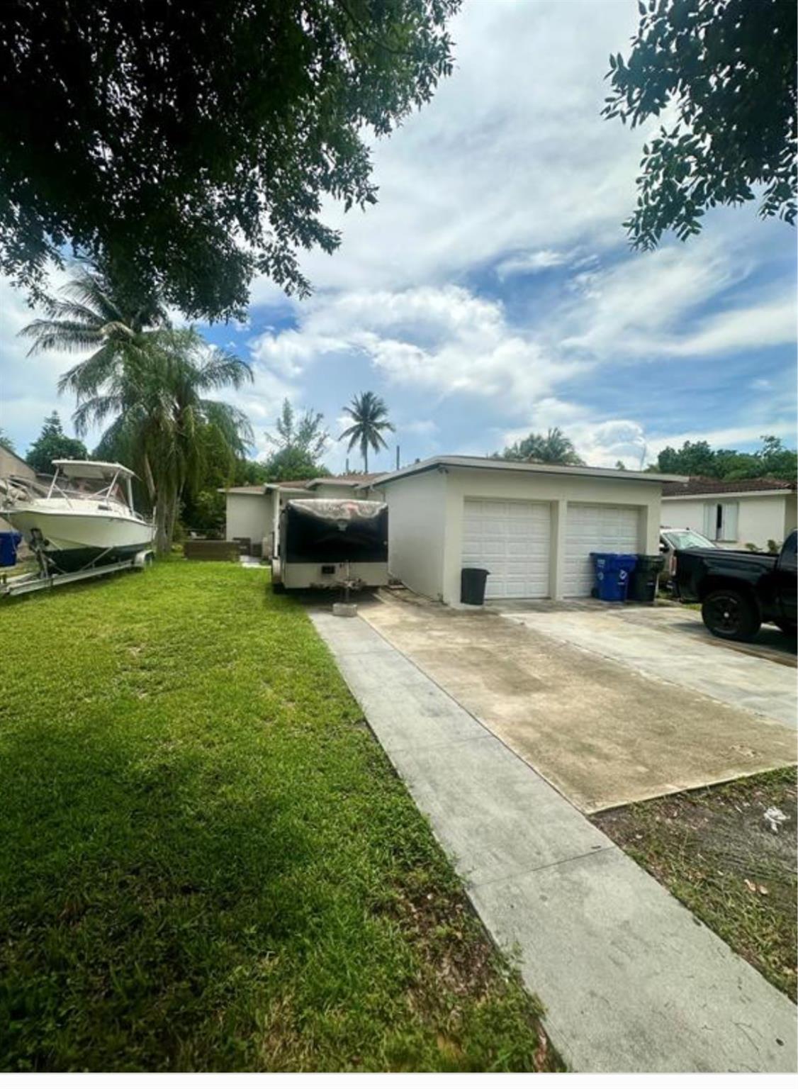 Updated 3/2 rental home on huge lot in a friendly neighborhood. 2 car garage. New kitchen with quartz countertops and stainless steel appliances. New bathrooms. New tile floors. Large wooden deck overlooking backyard. Excellent location in Central East Hollywood near Publix, shopping, and entertainment. A couple miles to the beach and a minute away from downtown Hollywood. Very good landlord.