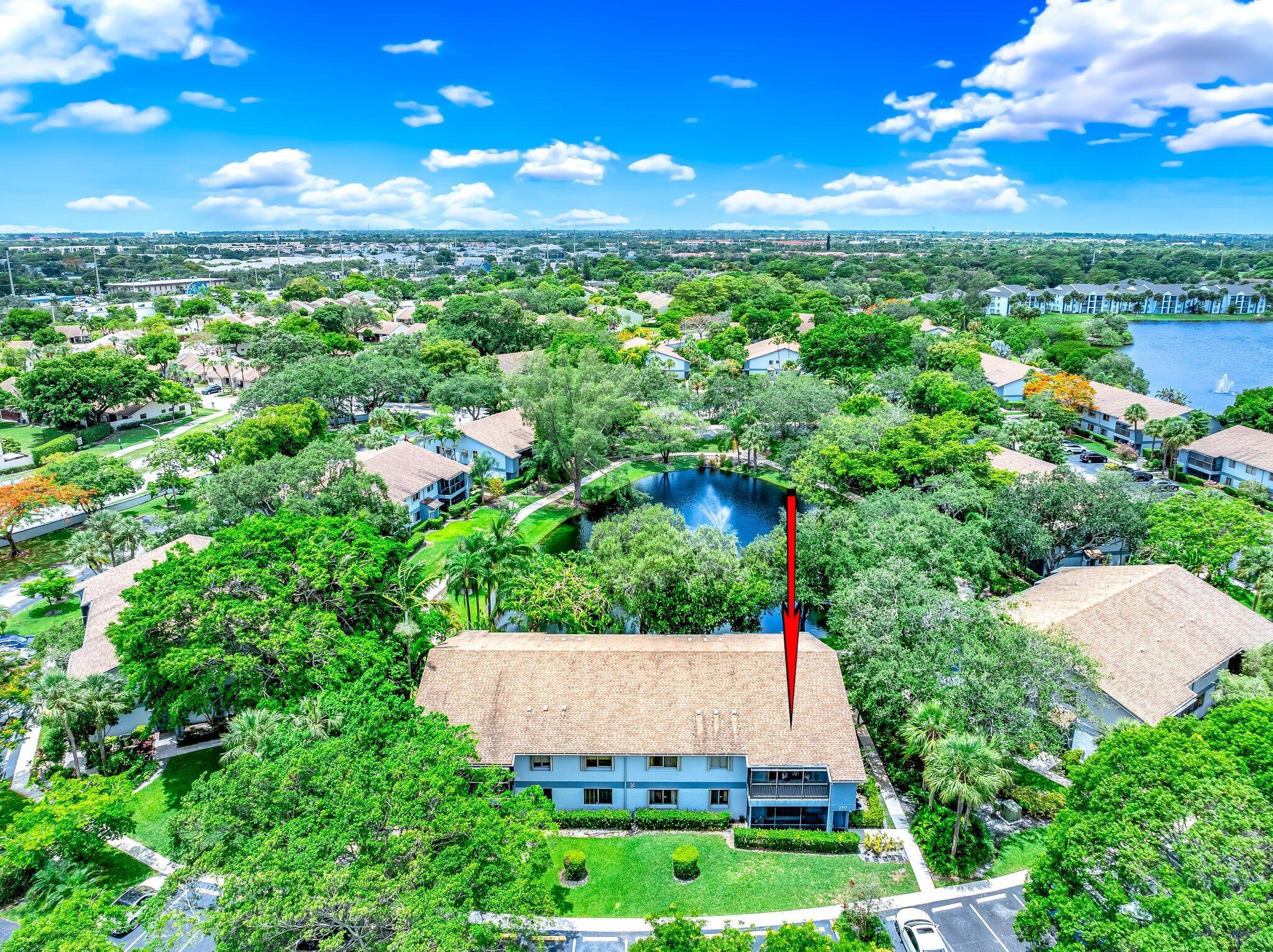 Welcome to this beautiful first-floor corner condo, featuring a spacious 2-bedroom, 2-bathroom layout designed for comfortable everyday living. The kitchen boasts updated appliances, while the in-unit washer and dryer add extra convenience to your routine.Step outside and enjoy the peaceful surroundings--this unit is just steps from a tranquil lake and scenic walking trails. The community offers a clubhouse and pool within easy walking distance, perfect for relaxing or entertaining.Ideally located near major highways, shopping, dining, and more, this pet-friendly home offers both comfort and convenience in a quiet, well-maintained neighborhood. **This property qualifies for a closing cost credit up to $3,975 through the seller's preferred lender.**