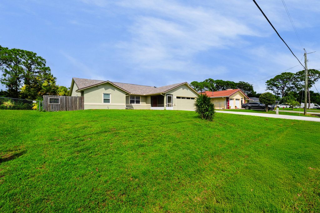 Photo of 665 NW Archer Avenue, Port Saint Lucie, FL 34983 (MLS # R11130443)