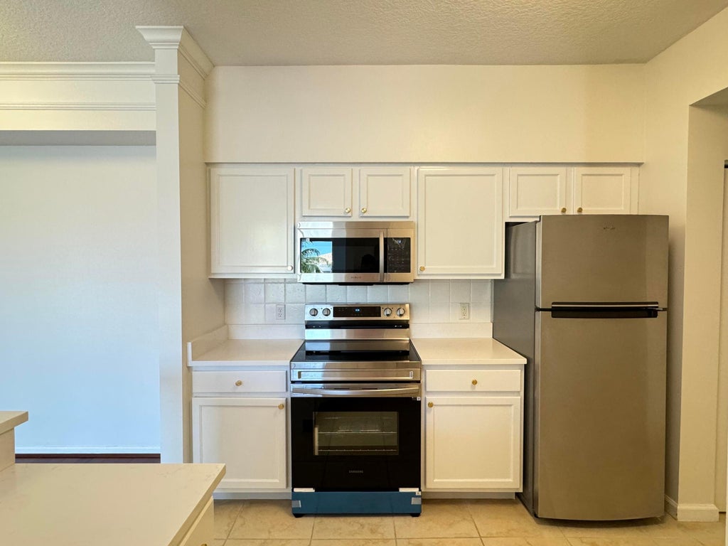 Photo of 5306 Myrtlewood Circle E, Palm Beach Gardens, FL 33418 (MLS # B26080598)