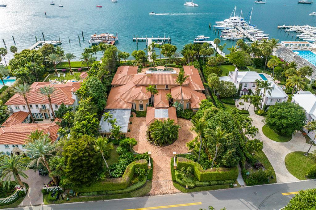 A boater's Dream! This property has the largest water frontage currently on the market in Palm Beach. It extends along 137.9 'offering stunning views in this deep water area of the intra-coastal. The home provides 5 bedrooms plus 3 staff quarters, soaring ceilings, and gracious outdoor entertainment space. A bonus to this property is the convenient deeded beach access at the coveted cabana on Ocean Terrace.