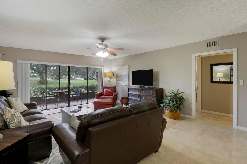 Photo of 9440 Meadowood Drive #103, Fort Pierce, FL 34951 (MLS # R11043083)