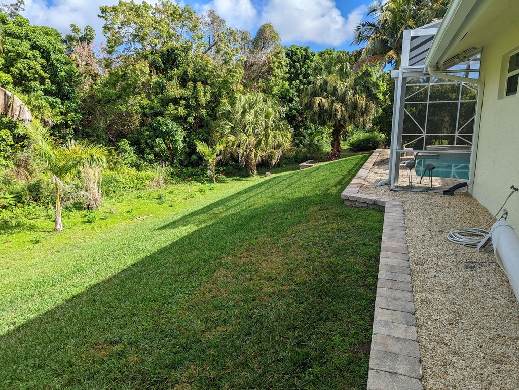 Photo of 3020 SE Farley Road, Port Saint Lucie, FL 34952 (MLS # R10784761)