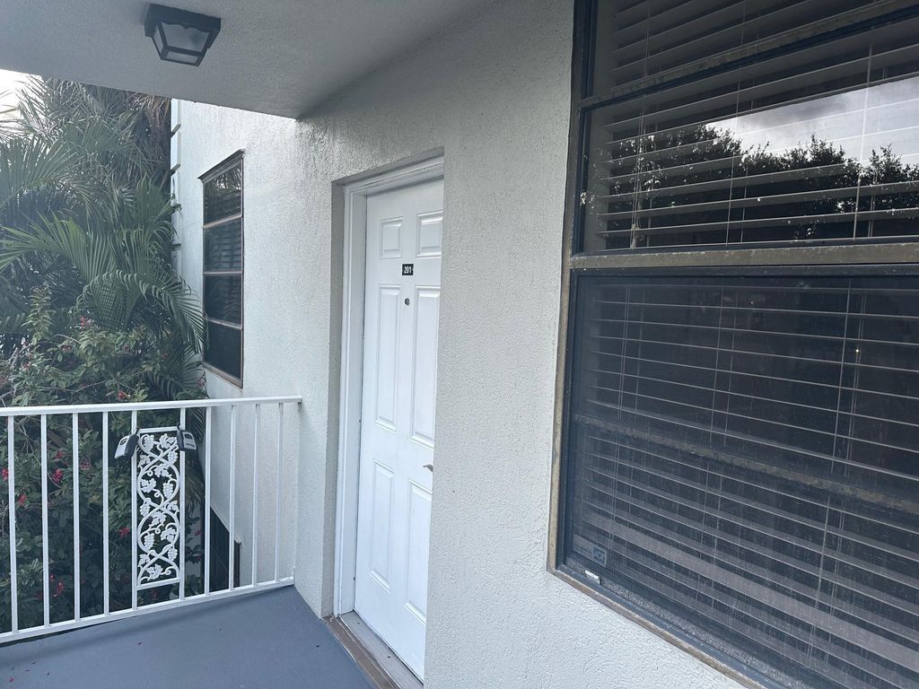 Photo of 1717 Whitehall Drive #201, Davie, FL 33324 (MLS # F10549533)