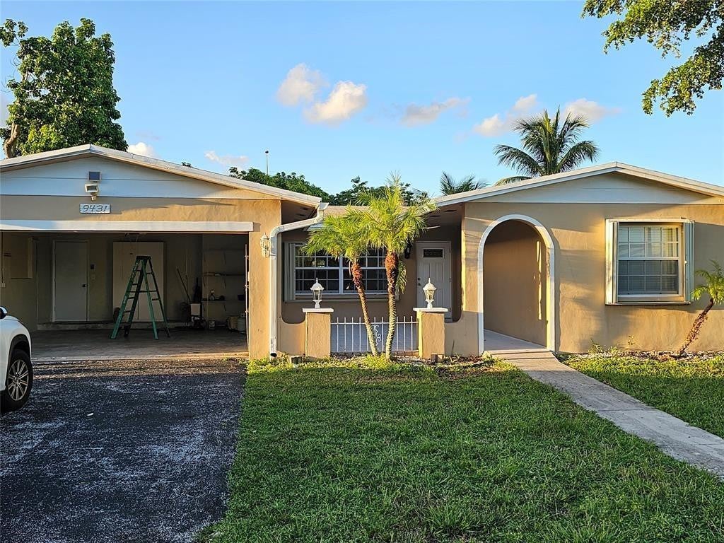 Photo of 9431 NW 24TH Place, Pembroke Pines, FL 33024 (MLS # B26074050)