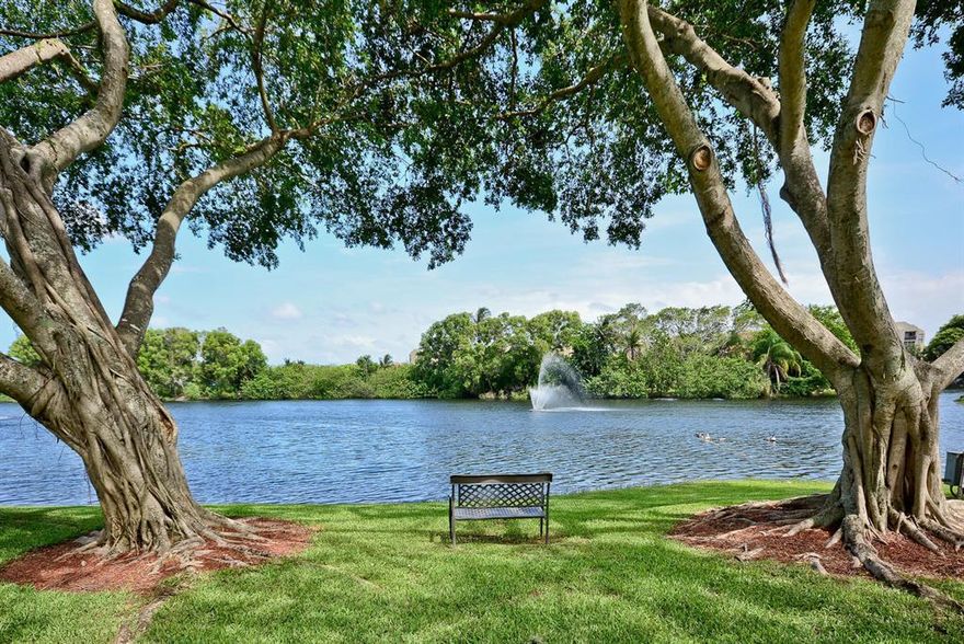 Wow!  Immaculate, 2 bed, 2 bath LAKEVIEW condo located in East Delay Beach. Enjoy open, light living area and beautiful water views leading to patio. Condo offers tiled flooring thru-out living areas, new wood flooring in both bedrooms, ceiling fans, newly painted interior and ready to move right in. Kitchen, with plenty of workspace, pantry and nook with laundry room to side with full size washer and drier and storage. Split bedroom floor plan for affords ultimate privacy. Primary boasts dual sinks, shower and WIC. 
Just over a mile to BEACH, easy access to I95 and to shopping- Whole Foods, Trader Joes and more. Community pool, clubhouse, exercise room. Association fee includes: insurance on building, water. Available for immediate rentals and assigned parking. PRICED 2 SELL!!