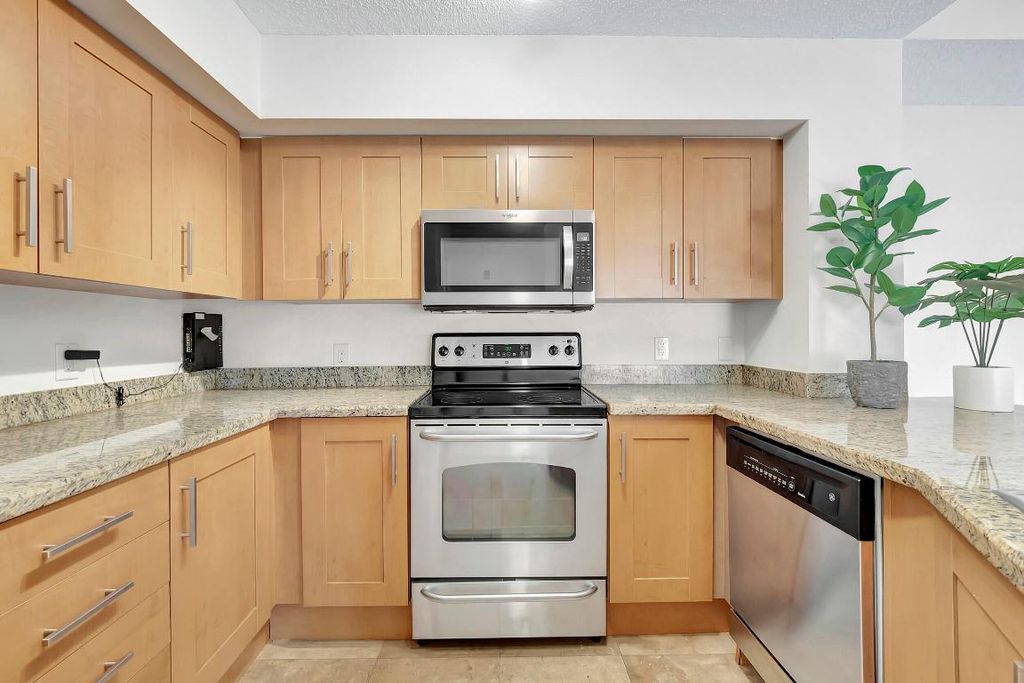 Photo of 3111 Clint Moore Road #203, Boca Raton, FL 33496 (MLS # R10962859)