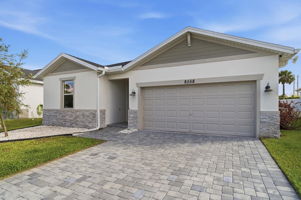 Photo of 8558 Dahlia Circle, Port Saint Lucie, FL 34986 (MLS # B26008297)