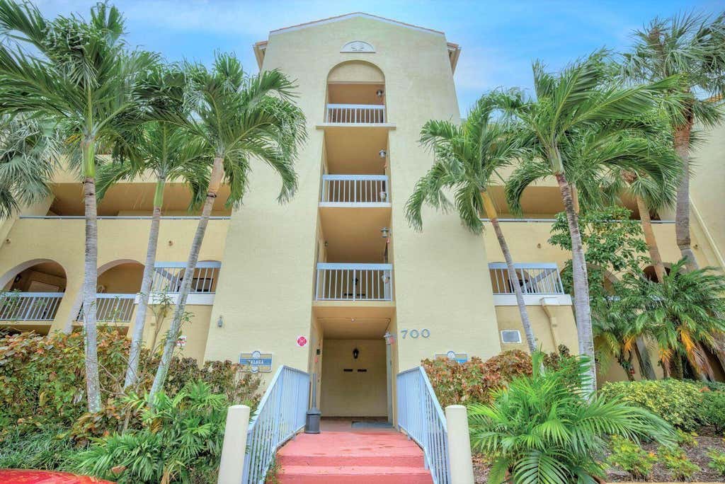 Photo of 700 Uno Lago Drive #403, Juno Beach, FL 33408 (MLS # B26051436)