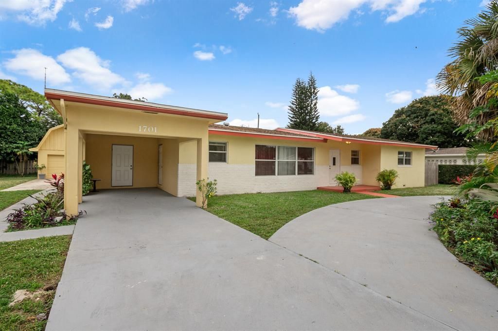 Photo of 1701 Boardman Avenue, Mangonia Park, FL 33407 (MLS # R10767329)