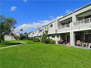 Stunning Lakeview Condo. Beautifully maintained 2 bed/2 bath condo, offering breathtaking lake views and just 5 miles from Lauderdale-by-the-Sea beach. Enjoy quick access to both the Turnpike and I-95, making this an ideal location for convenience and lifestyle. This bright and spacious unit features vaulted ceilings, laminate and ceramic tile floors and a functional layout. Washer and dryer in-unit. The community is pet-friendly and rich in amenities, including a pool, fitness center, spa, tennis courts, clubhouse, car wash area, and scenic walking trails surrounded by beautiful gardens. Ample guest parking and fast association approval. Perfect for investors or homeowners alike, currently rented through May 31, 2026, for $2,100/month with minimun 48 hours notice required to show.