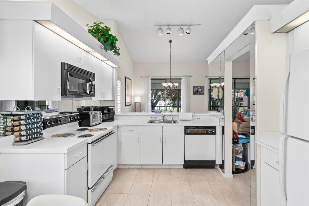 Photo of 10263 N Circle Lake Drive #201, Boynton Beach, FL 33437 (MLS # R11099008)