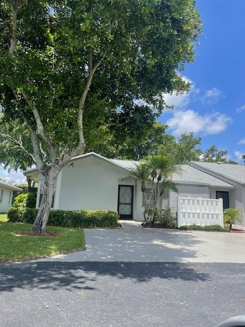 Fabulous corner unit with screen patio and extra storage room outside. 2-bedrm 2-bath all tile CLEAN and move in ready. Gated 55+ community per association. Tennis, pickleball, hot tub huge heated pool, gym and community room for cards etc. Don't wait this is the perfect home for you.