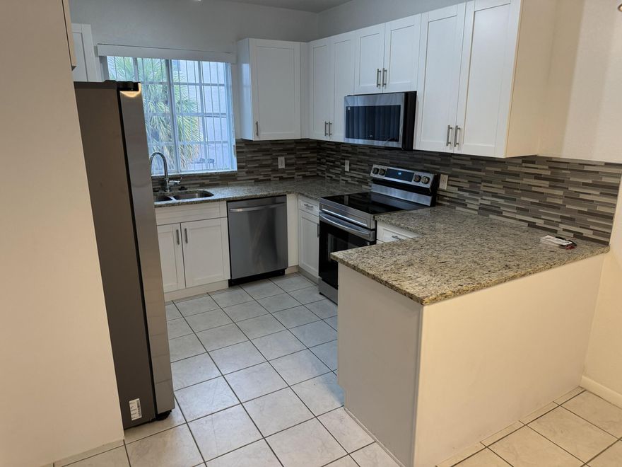 Right in the heart of Downtown Hollywood and 2.5 Miles from the beach. Beautiful 2 bedroom/2 bath, 2nd floor condo with balcony and hurricane impact windows.  Walking distance to restaurants, shops and Young's Circle.   One designated parking spot included within community. Additional parking within community may be obtained at a fee (based on availability). Street parking by Dixie Highway or Post Office Garage is also an option for any additional vehicles through Hollywood City Wide Parking Pass.   Unit water consumption/bill included as part of lease.    There are pet restrictions placed by the community along with additional pet fees which would be applicable. Approval required.   Credit Score (620+) and Background check will be conducted