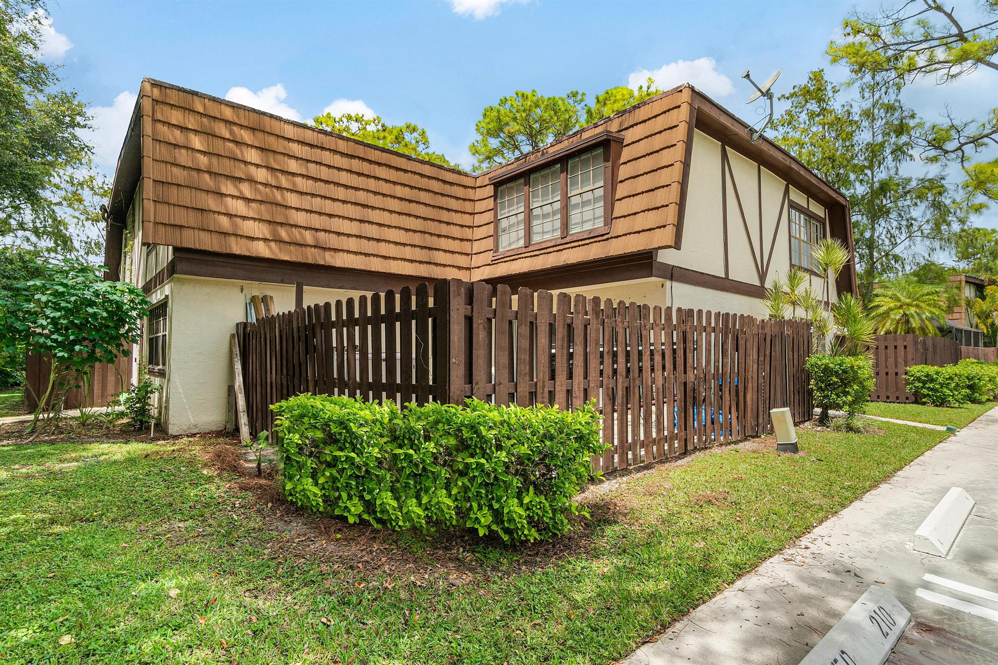 Opportunity for a lovely and VALUE-PRICED 2/2.5 townhome in the heart of Royal Palm Beach. Southern exposure makes for a light and bright home! Quiet location w/ no thru traffic. Open concept living perfect for entertaining - largest living space of any comparable townhome. Fenced patio is perfect for BBQ's, lounging in privacy or for play & pets. Bedrooms are expansive and each have an en-suite bath. Full-size washer/dryer. Lots of closet space. HOA includes roof maintenance, lawn care and amenities. Weybridge community offers a community pool and basketball and is centrally located near parks, restaurants, grocery - off Okeechobee which makes commute easy.
