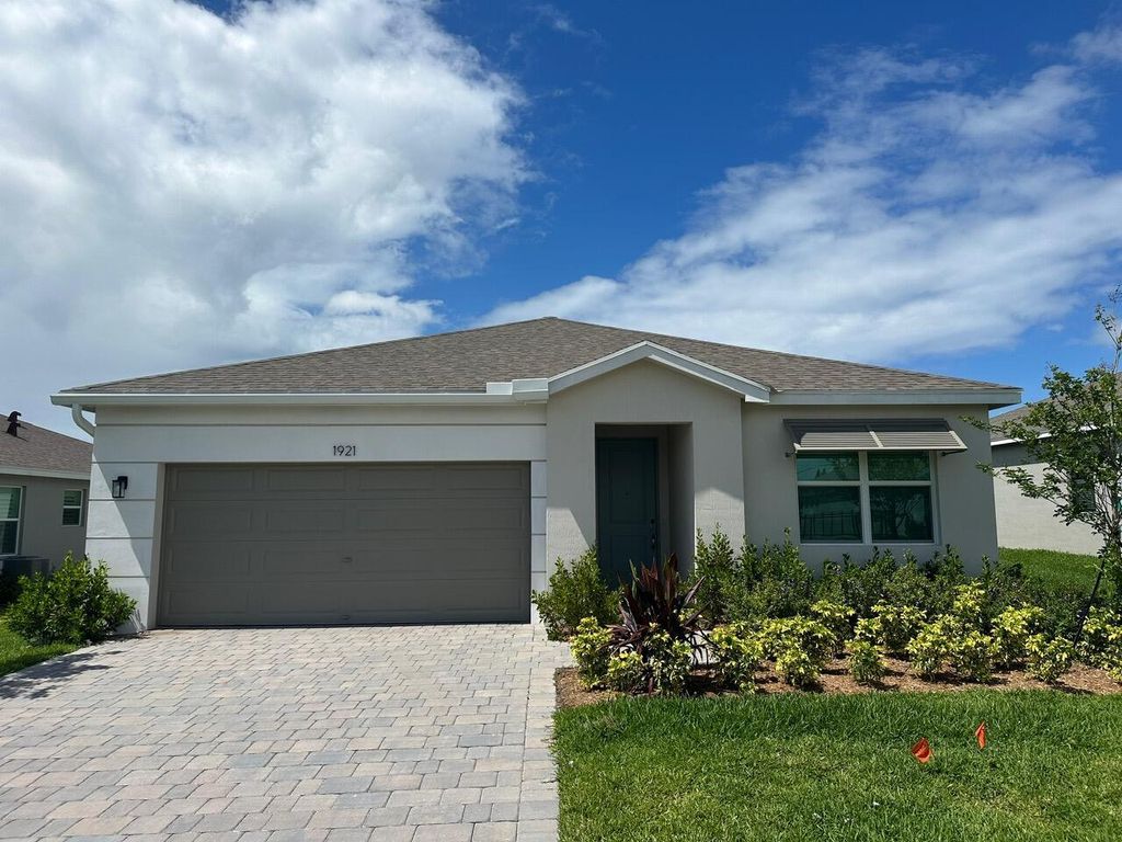 Photo of 1921 NE Ocean Dunes Drive, Jensen Beach, FL 34957 (MLS # R10985771)