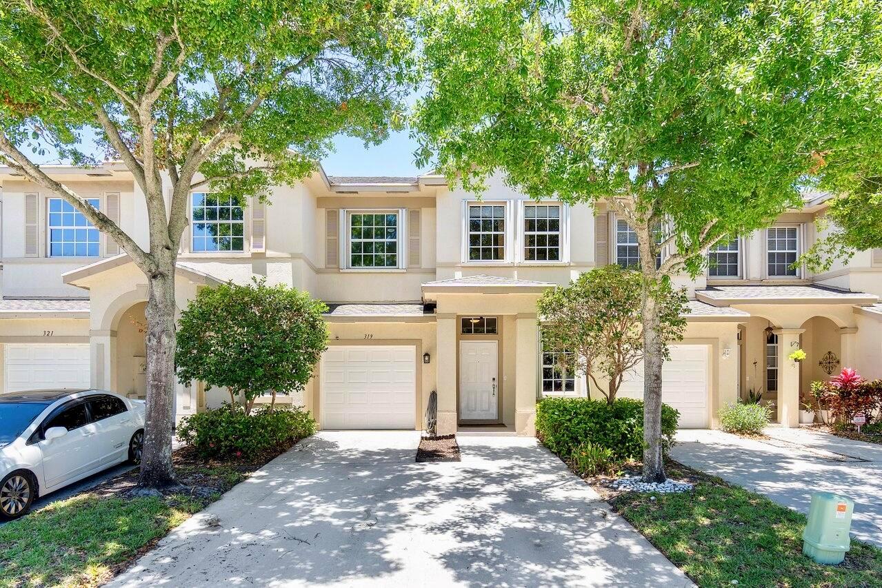 Well kept 3 bedroom, 2 1/2 bath townhouse with 1 car garage in gated community Cedar Ridge. This lovely home features accordion shutters all throughout windows and sliding door. The roof, AC Handler and Water Heater were replaced in 2022. The master bathroom had a complete remodel in 2020. Fenced-in yard. Tile throughout first floor and carpet upstairs, including all bedrooms. HOA covers exterior maintenance including the roof and painting, building insurance, ADT, basic cable and lawn care. Conveniently located with easy access to i95, close to dining, shopping, brewery and a short drive to the beach.Must see!!