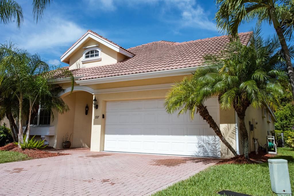 Photo of 727 SW Munjack Circle, Port St Lucie, FL 34986 (MLS # R10880043)