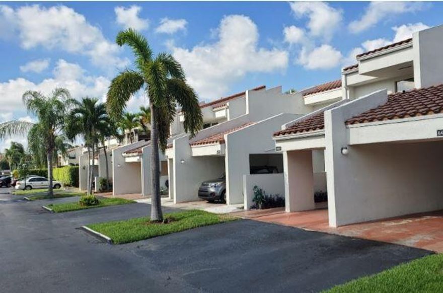 Welcome to this beautifully maintained three bedroom, two and one half bathroom townhome located in the Courts Of Inverray community in Lauderhill, Florida. This spacious two story home features tile flooring throughout the entire lower level, creating a clean and modern feel. The kitchen is equipped with stainless steel appliances and a matching backsplash, perfect for entertaining. Upstairs, the primary suite offers peaceful canal views and features a modern shower, dual sinks and a walk in closet. This gated community includes a heated pool, fitness center, walking trails and a play area. Conveniently located next to Ilene Lieberman Botanical Gardens and walking distance to Inverray Golf Club.  Quick access to various shops, supermarkets and restaurants.  Schedule a tour today!