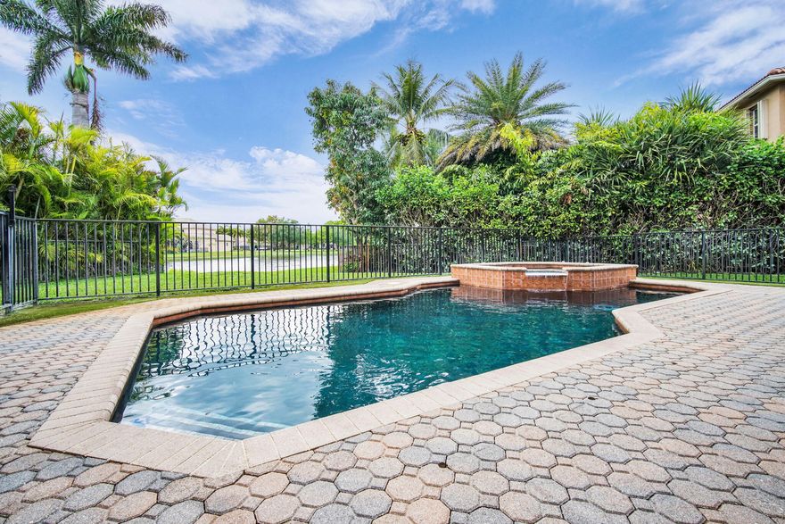 Welcome to your private slice of South Florida paradise in the heart of Lake Worth! This beautifully maintained residence blends comfort, style, and effortless indoor-outdoor living. From the moment you arrive, you're greeted by inviting curb appeal and a warm, open layout designed for modern living. The spacious living areas flow seamlessly into a well-appointed kitchen—perfect for entertaining or everyday enjoyment. Step outside to your serene backyard retreat, ideal for relaxing evenings or weekend gatherings. Nestled in a desirable community with convenient access to top-rated schools, shopping, dining, and major roadways, this home offers the perfect balance of tranquility and accessibility. Don't miss this opportunity to own a home that truly has it all!