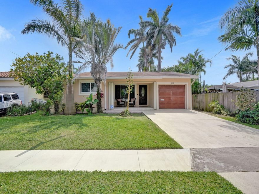 Welcome home!  Your Dania Beach paradise awaits you.  You will fall in love the second you walk through the front door with clean, well kept, open living area and the large windows in the sunroom bringing in so much natural light.  The indoor / outdoor flow to the deck is perfect for entertaining friends and family in your large back yard for summertime BBQ's.  Featuring an indoor laundry room , large bedrooms, and a beautifully remodeled kitchen, and accordion hurricane shutter protection.  Just a short bike ride to Dania Beach, Publix , and restaurants.  Take your kayak down the street and enjoy the natural beauty West Lake Park has to offer.  You do not want to miss this one.  Schedule your private showing today!