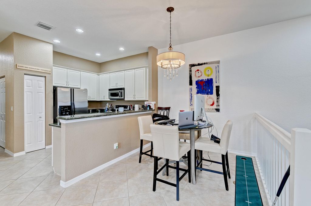 Photo of 4851 Bonsai Circle #203, Palm Beach Gardens, FL 33418 (MLS # R10840278)