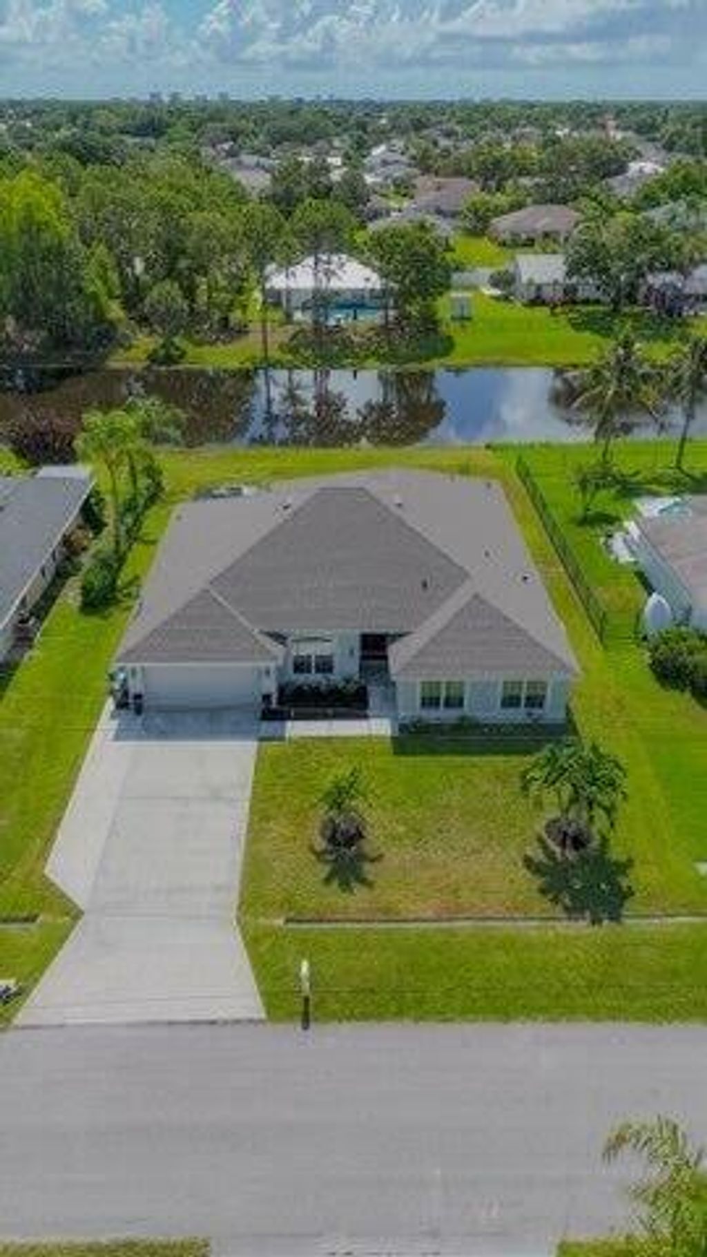 Photo of 1925 SE Mantua Street, Port Saint Lucie, FL 34952 (MLS # R11102617)