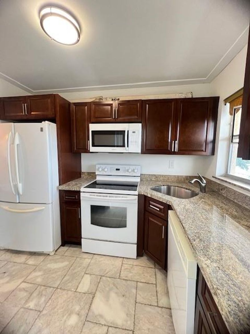 Nicely remodeld 2/2 condo in Sunrise Lakes Phase 2.  Serene lake views in a peaceful 55+ community.  Spacious bedrooms with walk-in closets. Designated parking spot.  Includes internet, basic cable, water, pest control, and trash removal.  Building has new roof, structural improvements  and painting in process.
A clubhouse with many amenities such as pool, fitness center, tennis courts, barbecue area, and social events & activities.