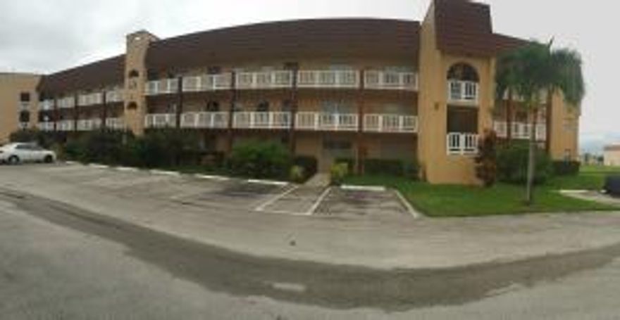 Magnificent 2/2 water view condo on the second floor.Lots of updates. New kitchen cabinets. New water heather.Laminate floors all over, title in kitchen and bathrooms. Totally closed patio used as Florida room, extra space.Assoc 55+ with all type of activities. Heated pools, tennis courts, golf, close to everything. Excellent price for a relaxing Sunny Florida location, Furniture available. Ready to move in.