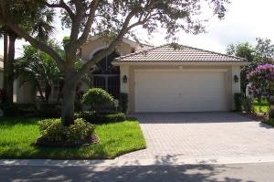 Desirable South Pacific model in beautiful condition, on premium quiet lakefront lot. Custom landscaping greet you as you arrive. Den can be 3rd bedroom. Extended roofed, screened patio with tiled flooring. View the serene lake from the kitchen & breakfast area, living/dining room, and master bedroom.   Vaulted ceilings are illuminated with plant shelf lighting. Upgraded a/c (2012) and  accordian shutters. Intercom throughout home with radio & music.  Beautiful built-in furniture in den included in sale. Enjoy the resort-style 55+ clubhouse  with a cafe, shows, luncheons, clubs, tennis, pools, fitness center,  pickle ball, etc. and activities all year long.