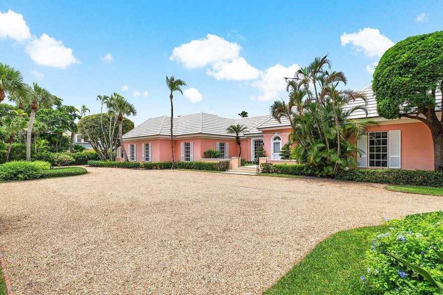 This never before offered property is one of the few homes sitting directly on Fairway 5 of the renowned Jupiter Island Club. Set on .63 acres, this Bermuda-style estate includes a five-bedroom main house and a two-bedroom guest house, added in 1990. With breathtaking views of the golf course and vibrant sunsets over the Intracoastal, this home provides a rare opportunity for someone seeking both privacy and the ability to entertain on a grand scale. While largely original, the generous footprint and timeless style provide an ideal foundation for a thoughtful renovation or a bespoke new build.