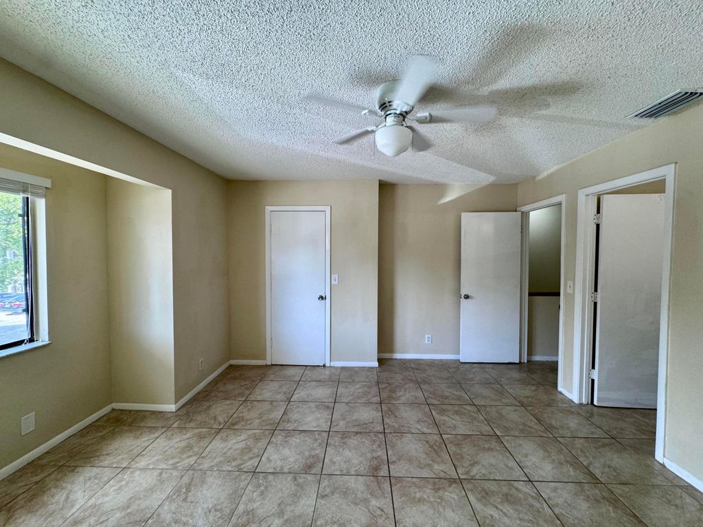 Photo of 704 Riverside Drive, Greenacres, FL 33463 (MLS # B26022455)