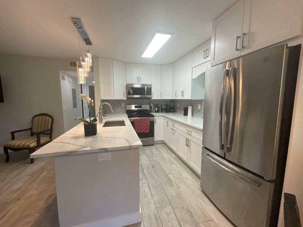 Photo of 634 Normandy N, Delray Beach, FL 33484 (MLS # R11152356)