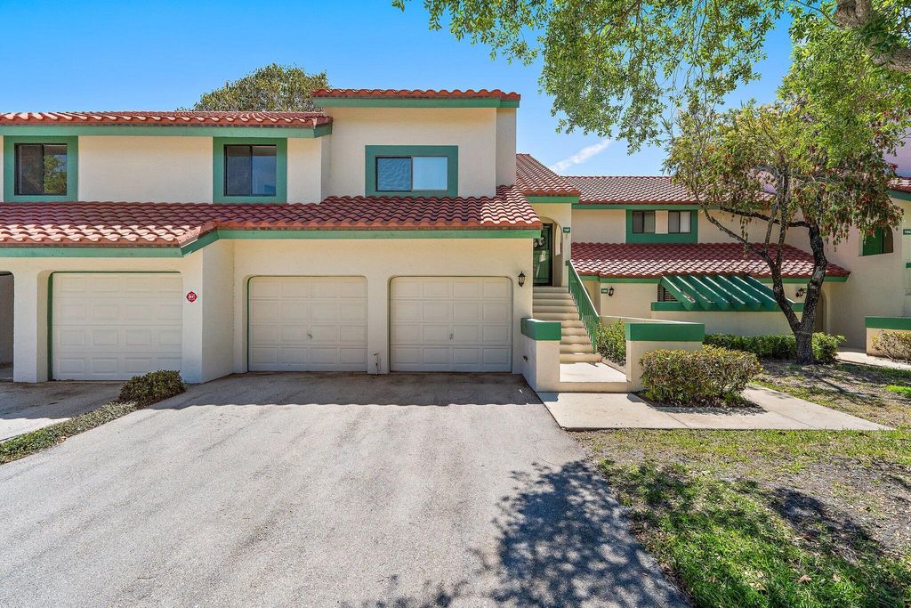 Photo of 19 Lexington Lane W, Palm Beach Gardens, FL 33418 (MLS # B26006574)