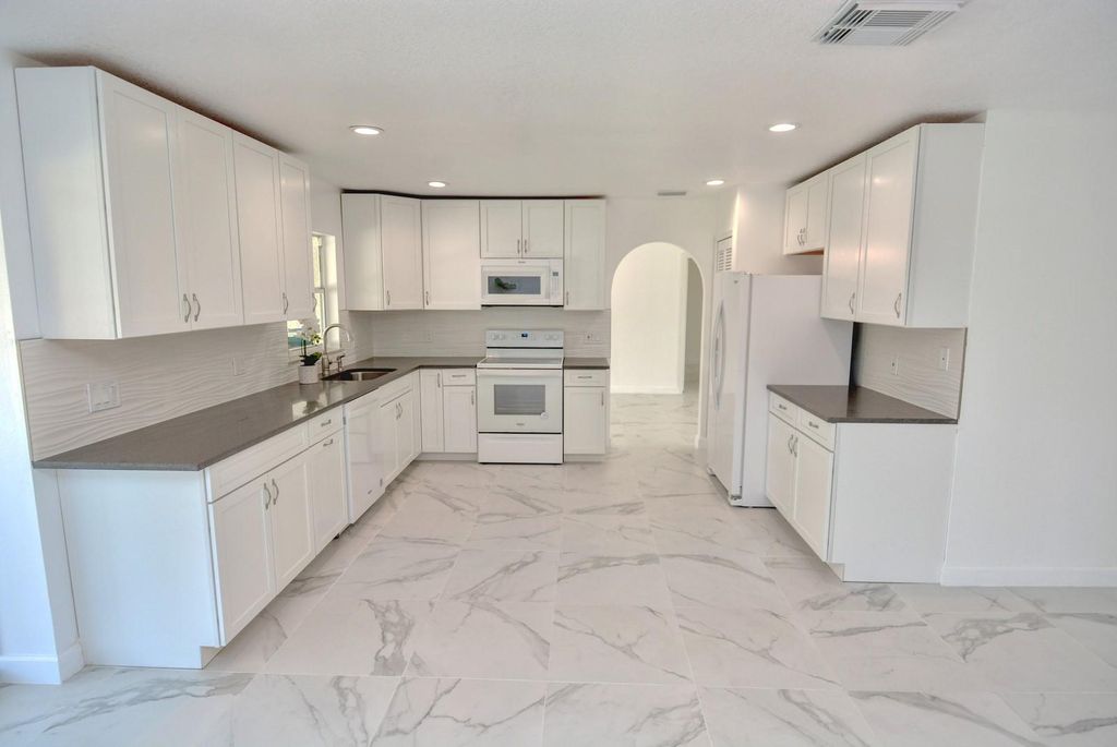 Photo of 943 SW Browning Avenue, Port Saint Lucie, FL 34983 (MLS # F10448711)