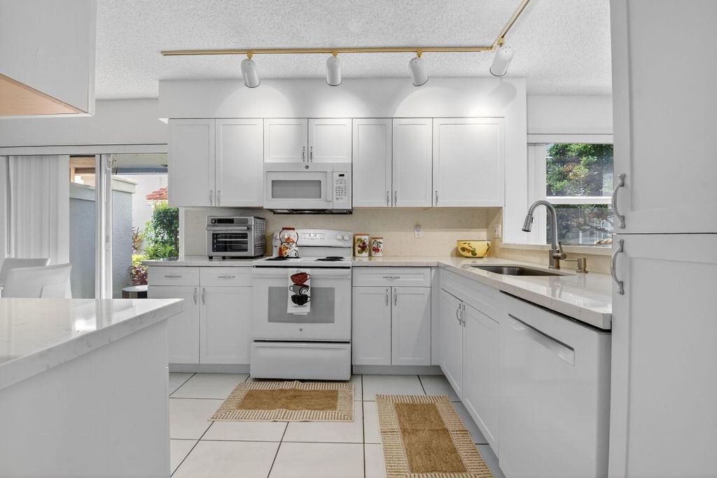 Photo of 7390 Lake Meadow Way #101, Boynton Beach, FL 33437 (MLS # R11106500)