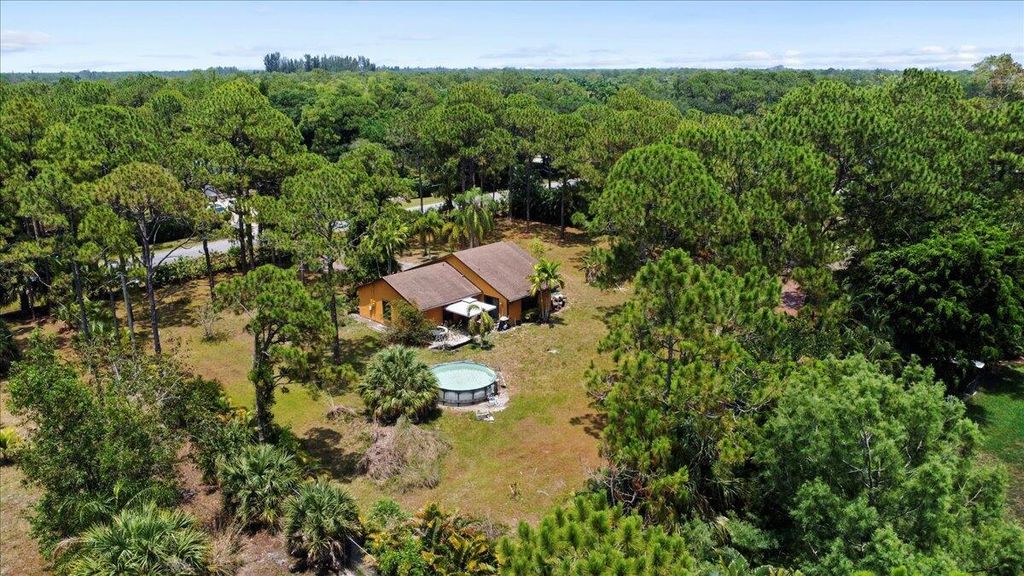 Photo of 12610 63rd Lane N, The Acreage, FL 33412 (MLS # R11086180)