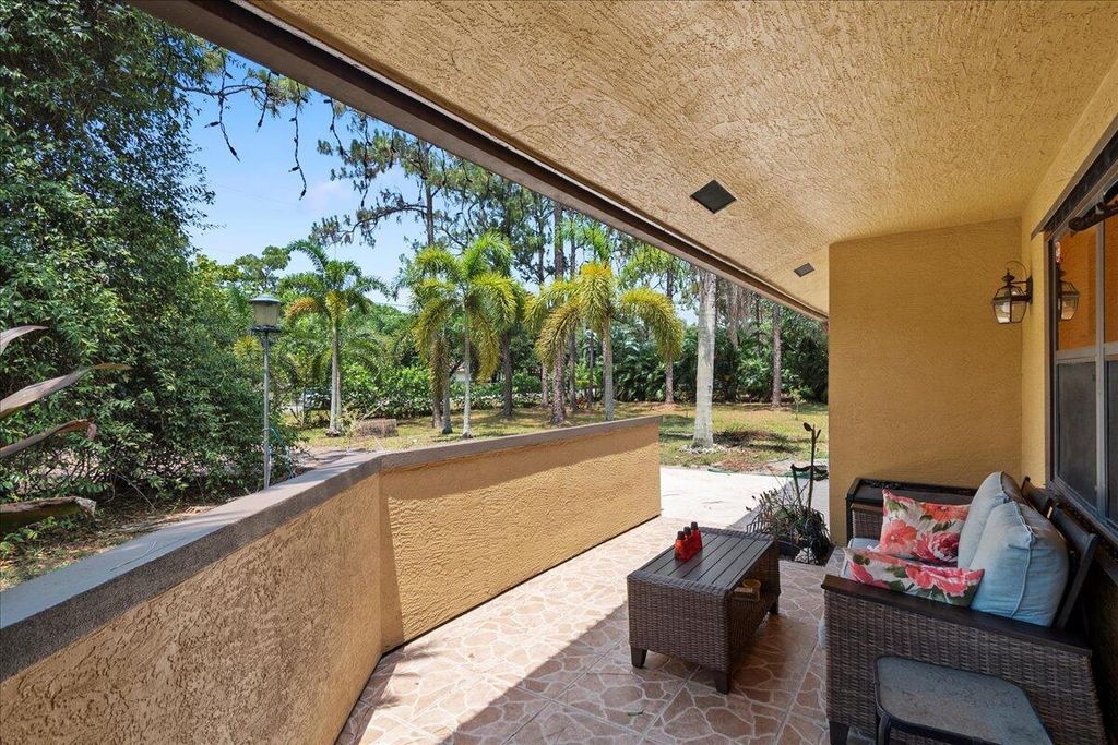 Photo of 12610 63rd Lane N, The Acreage, FL 33412 (MLS # R11086180)