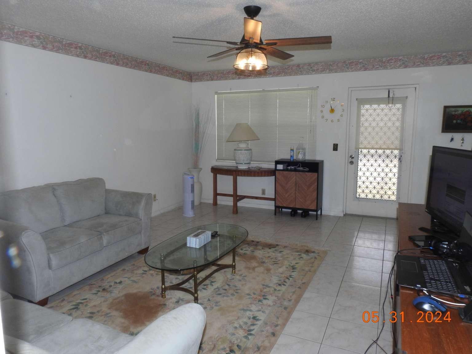 2 bedrooms, 1.5-bathroom, classic ceramic tiles in the living area and laminate wood floors in the bedrooms! The updated kitchen includes additional glass-front cabinets. white appliances. The screened patio overlooks the spacious garden. A local bus stop right in front. Short distance from the pool. A lavish clubhouse with a 1,500-seat theater, a state-of-the-art gym, tennis courts, an indoor and outdoor pool, classes for all skill levels, and more are among the many amenities available. Water and cable included