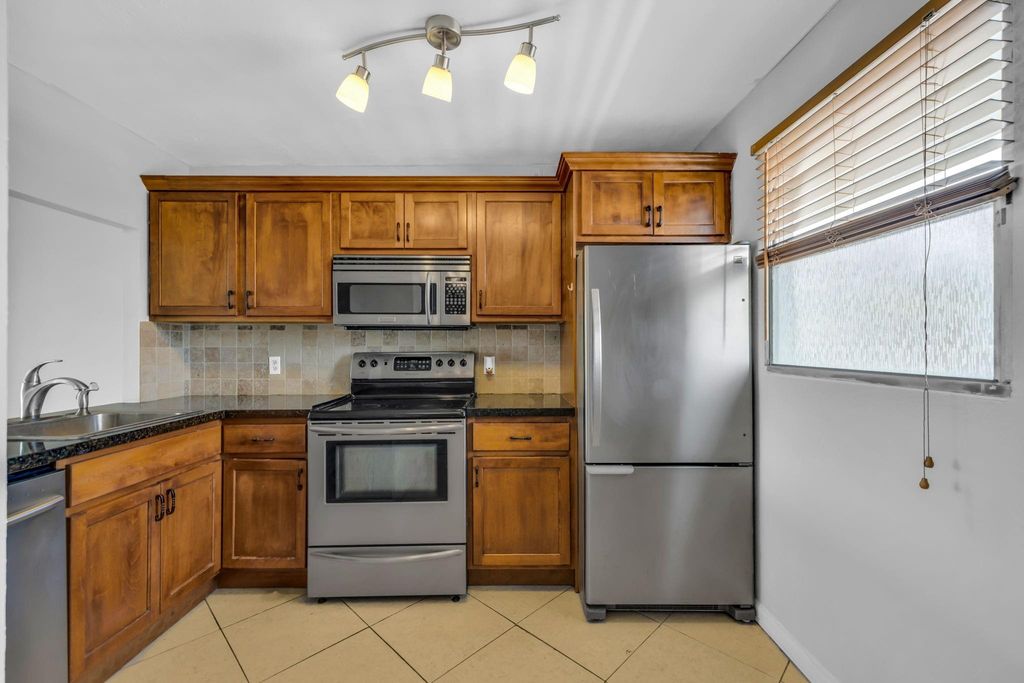 Photo of 110 Royal Park Dr #2G, Oakland Park, FL 33309 (MLS # F10515878)